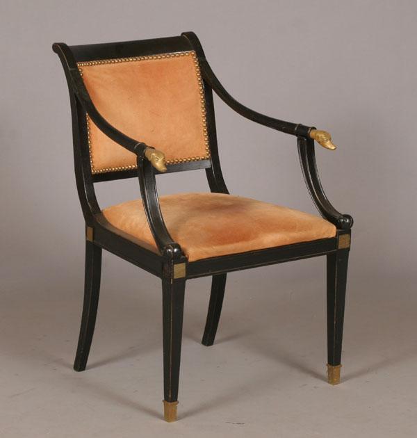 Appraisal: Chapman Spain ebonized upholstered arm chair with hound head design