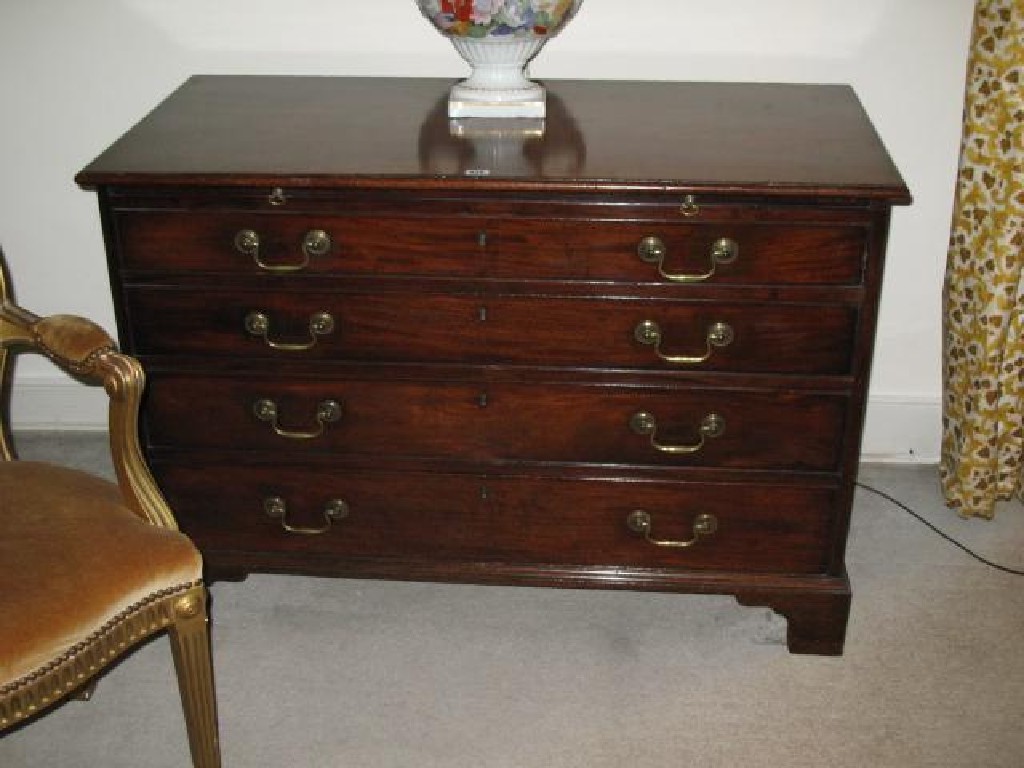 Appraisal: A GEORGE III MAHOGANY CHEST OF DRAWERS the rectangular top