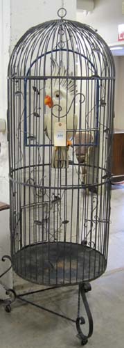 Appraisal: IRON FLOOR BIRDCAGE ON STAND the cylindrical cage having a