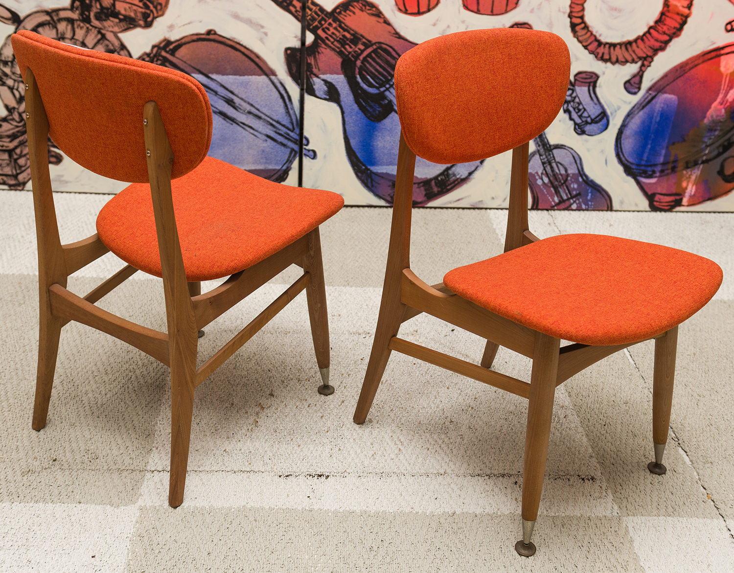 Appraisal: A PAIR OF MID TH-CENTURY UPHOLSTERED CHAIRS IN ORANGE FABRIC