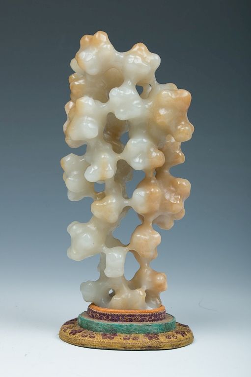 Appraisal: JADE SCHOLAR'S STONE QING Standing on a foot relatively narrower