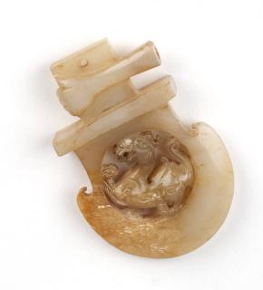 Appraisal: A Chinese archaic th century of translucent light brown jade