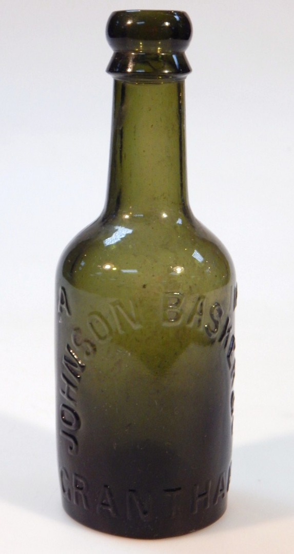 Appraisal: A Johnson Basker Co Grantham green glass beer bottle with