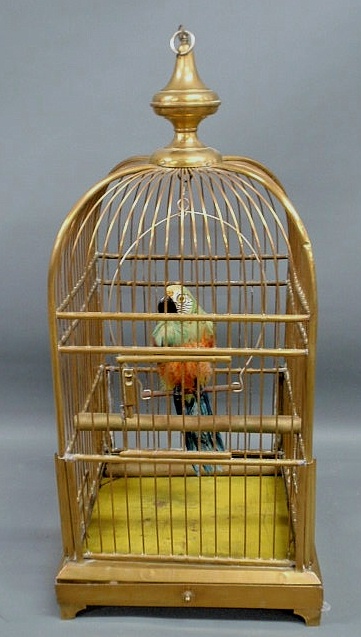 Appraisal: Parrot in a brass cage h base x