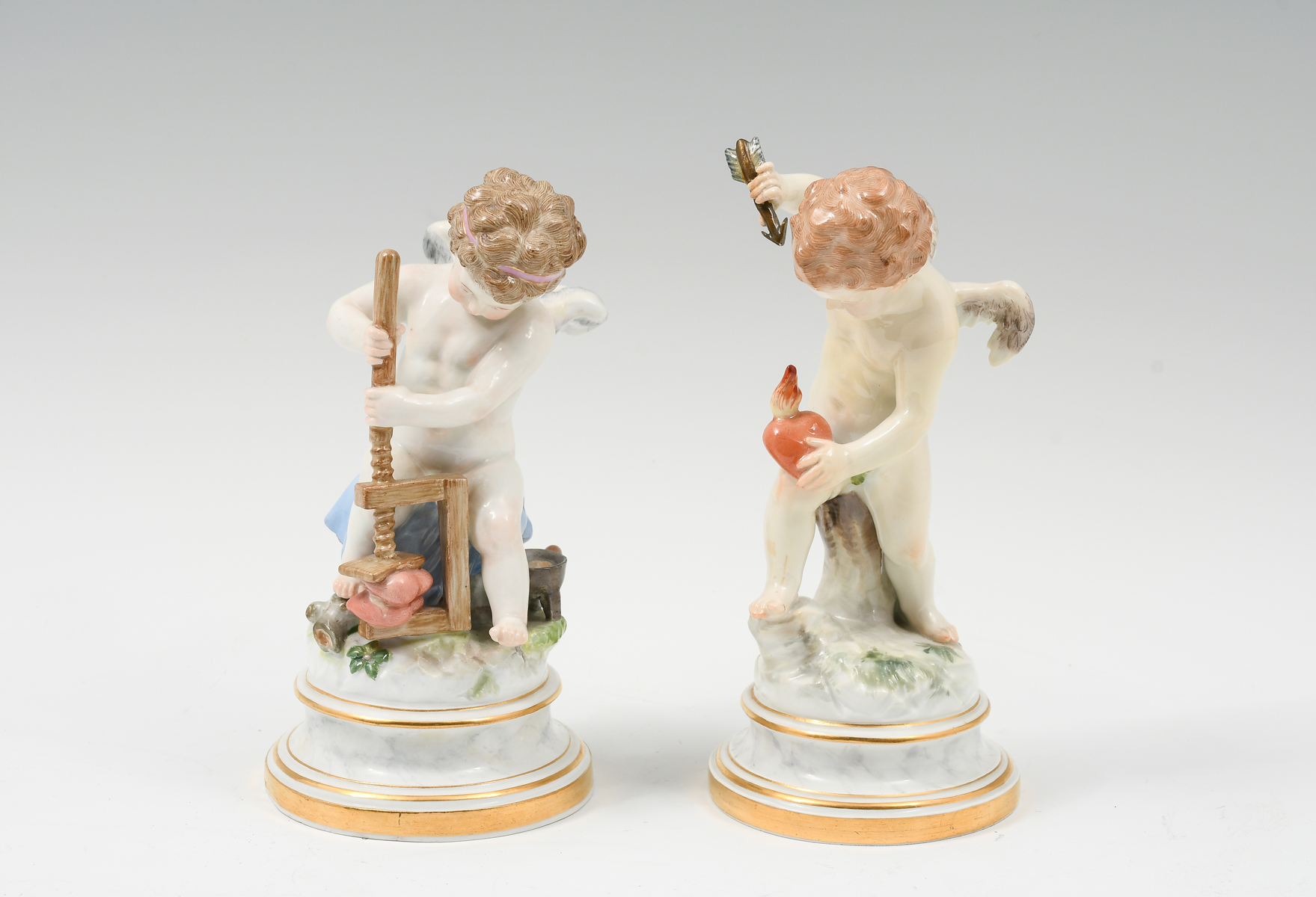 Appraisal: PC MEISSEN PORCELAIN CUPIDS WITH HEARTS Circa Meissen Porcelain Cupid