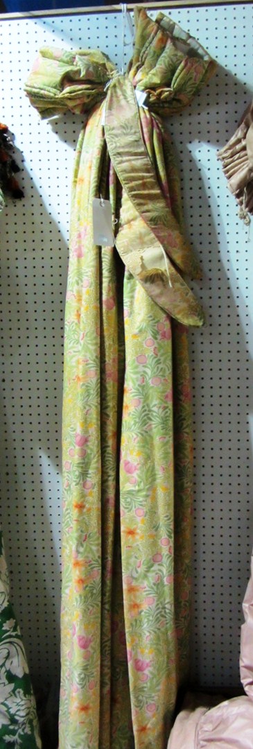 Appraisal: Two floral line curtains with tie backs