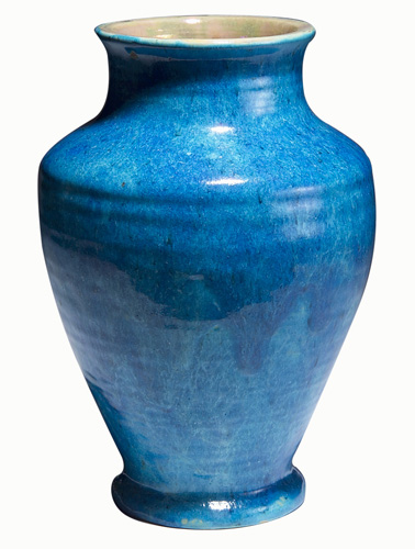 Appraisal: PEWABIC Tall baluster vase covered in Persian blue mottled glaze