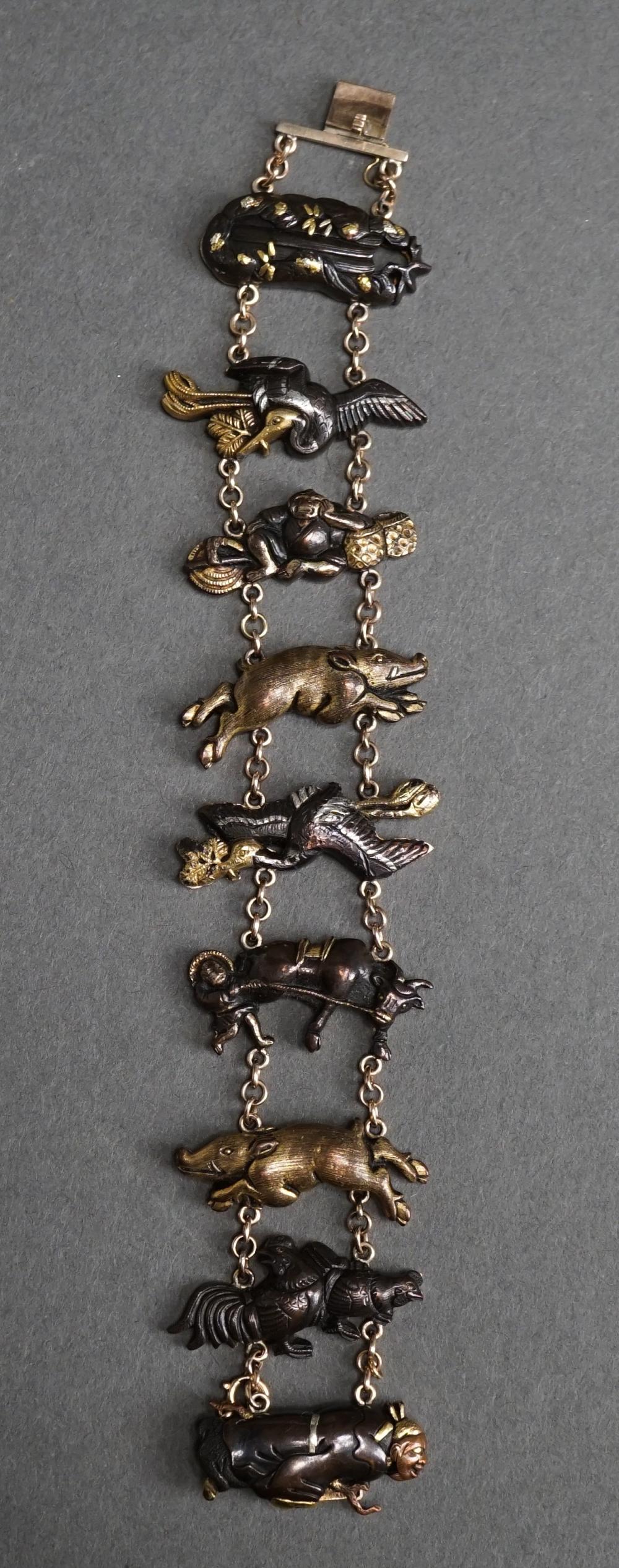 Appraisal: Japanese -Karat Yellow-Gold and Shakudo Bronze Figural Bracelet th-Early th