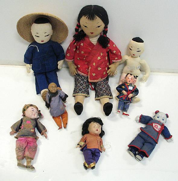 Appraisal: a group of twelve Chinese and American dolls and cloth-dressed