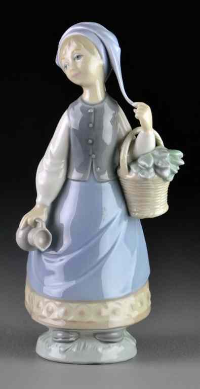 Appraisal: Lladro Porcelain Figurine ''Woman with Scarf''Depicting a woman wearing a