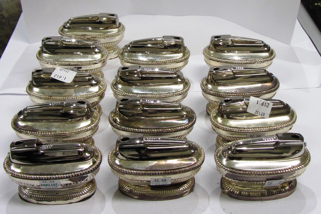 Appraisal: Thirteen silver plated Ronson table lighters each of oval form