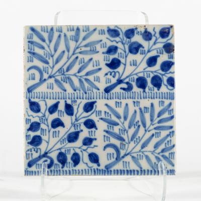 Appraisal: William Morris a 'Bough' design blue and white decorated tile