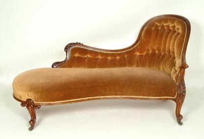 Appraisal: A VICTORIAN WALNUT FRAMED CHAISE LONGUE of serpentine outline button