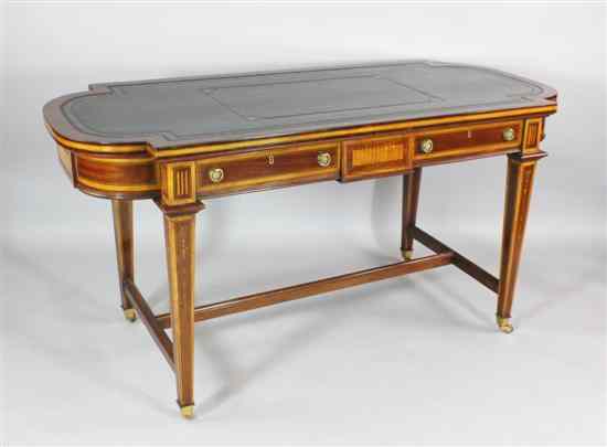 Appraisal: An Edwardian inlaid mahogany writing table with leather inset top