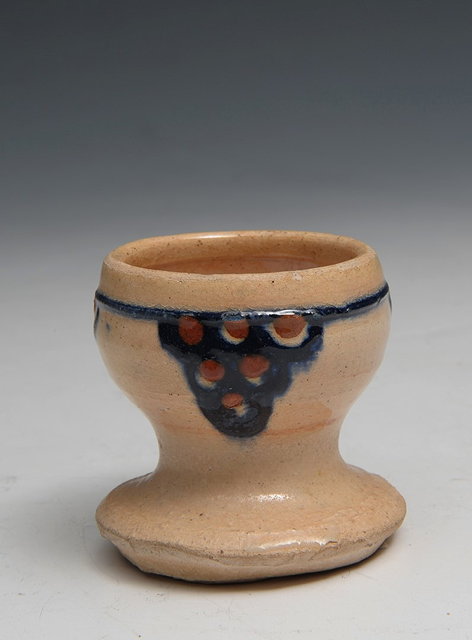 Appraisal: Leach Pottery probably Bernard LeachEgg cuppainted motifs in the form