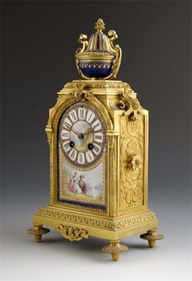 Appraisal: A th century French ormolu and porcelain mounted mantel clock