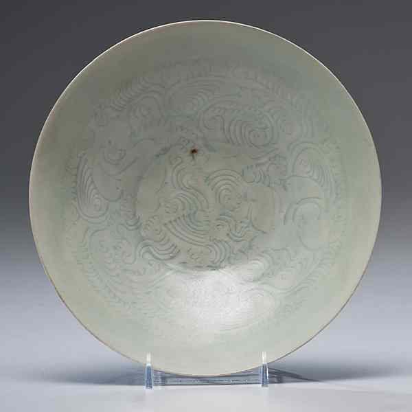 Appraisal: Carved Celadon Bowl Chinese Song Dynasty-style A carved celadon bowl