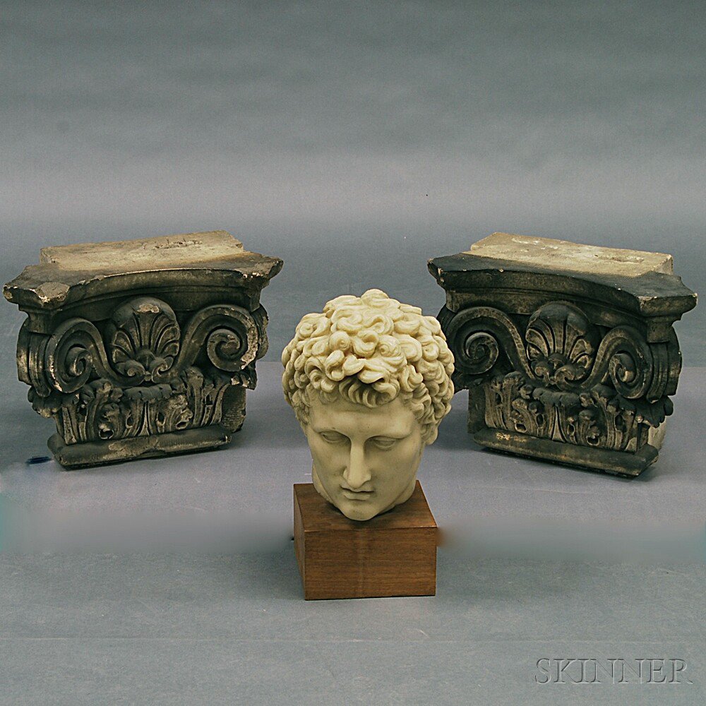 Appraisal: Two Concrete Corinthian Capitals and a Composite British Museum Replica