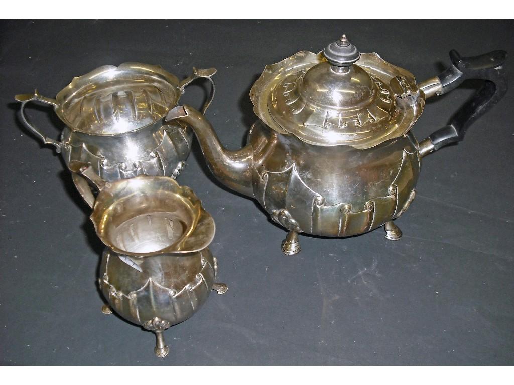 Appraisal: Three piece tea service with raised wavy borders over embossed