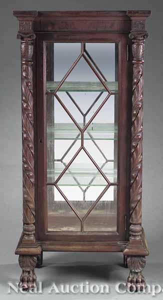 Appraisal: A Small Colonial Revival Carved Mahogany Curio Cabinet in the