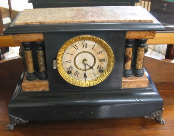 Appraisal: TWO AMERICAN MANTEL CLOCKS One is an ebonized clock with