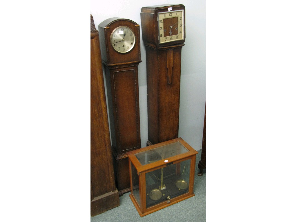 Appraisal: Lot comprising two oak cased Grandmother clocks and a set