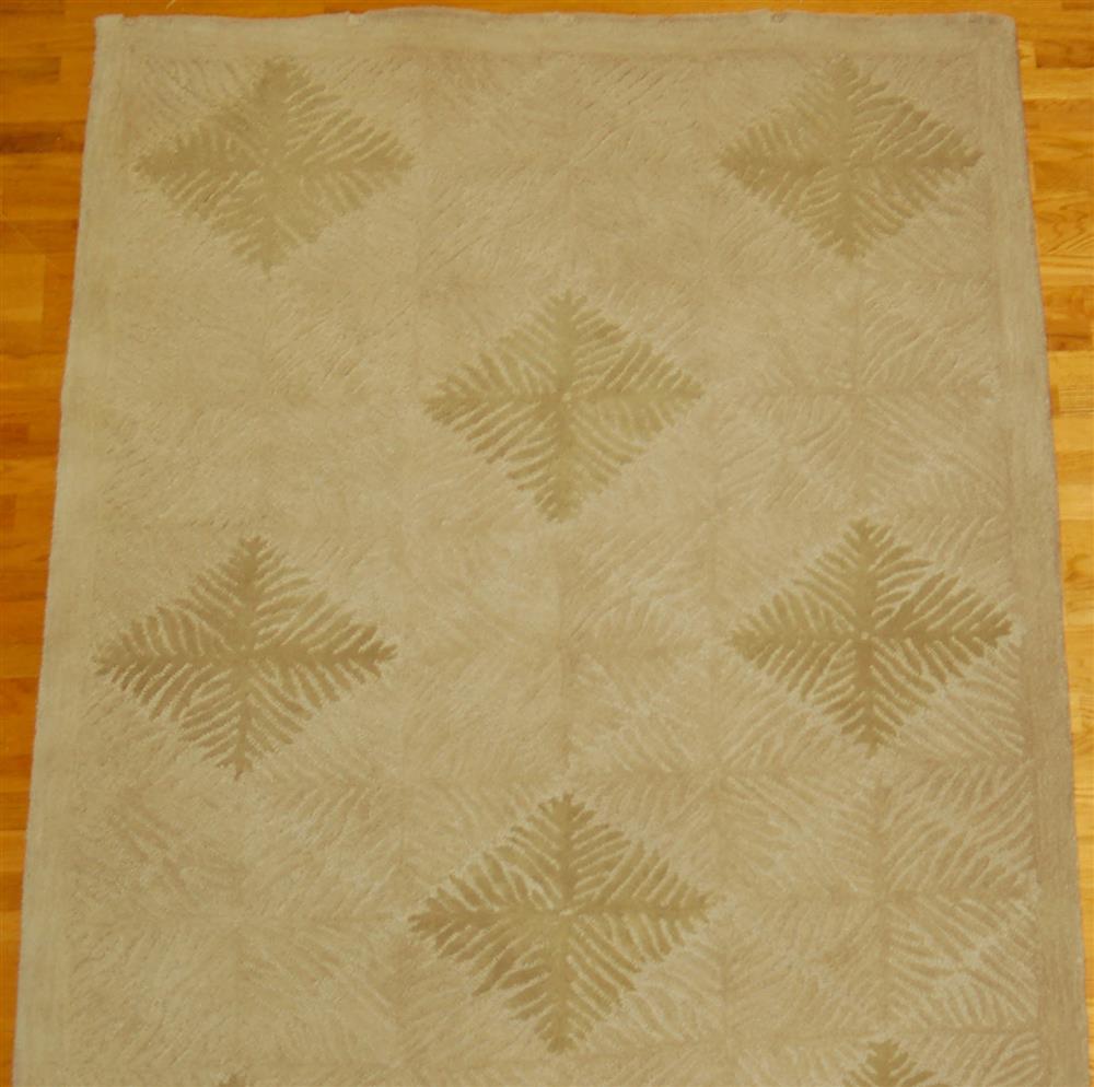 Appraisal: TRANS OCEAN INDIAN WOOL RUG having multiple shades of tan