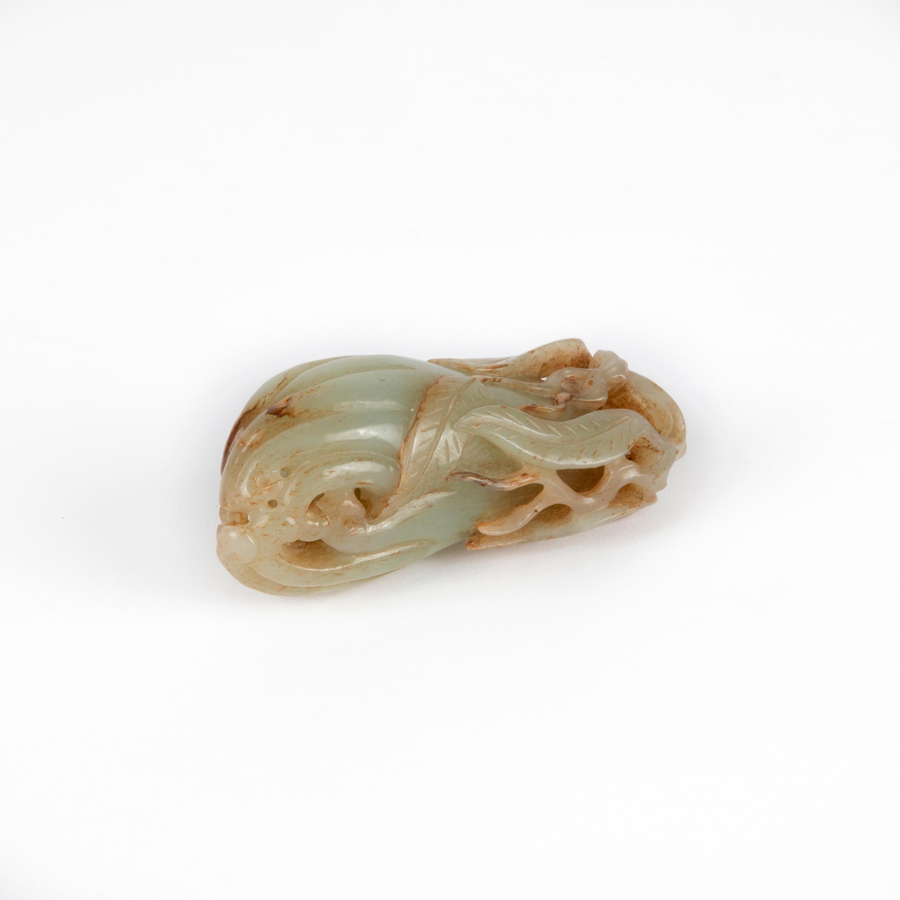 Appraisal: NEPHRITE JADE CARVING OF BUDDHA'S HAND CITRON A Chinese carved