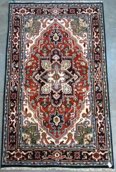 Appraisal: A Handmade Oriental Area Rug Heriz design orange brown field