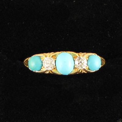 Appraisal: A Victorian turquoise and diamond five stone ring set in