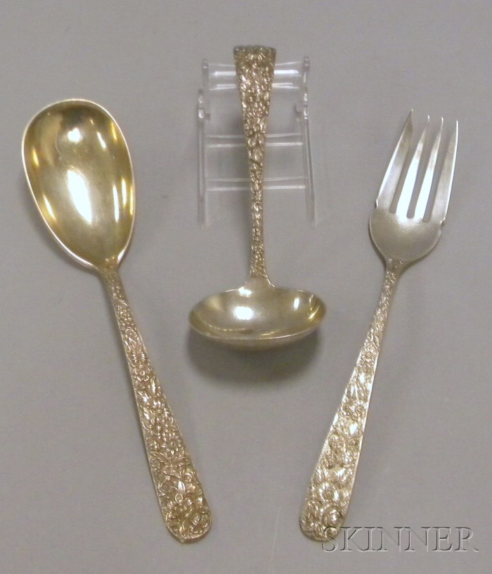 Appraisal: Three Sterling Silver Repousse Serving Items a large serving spoon