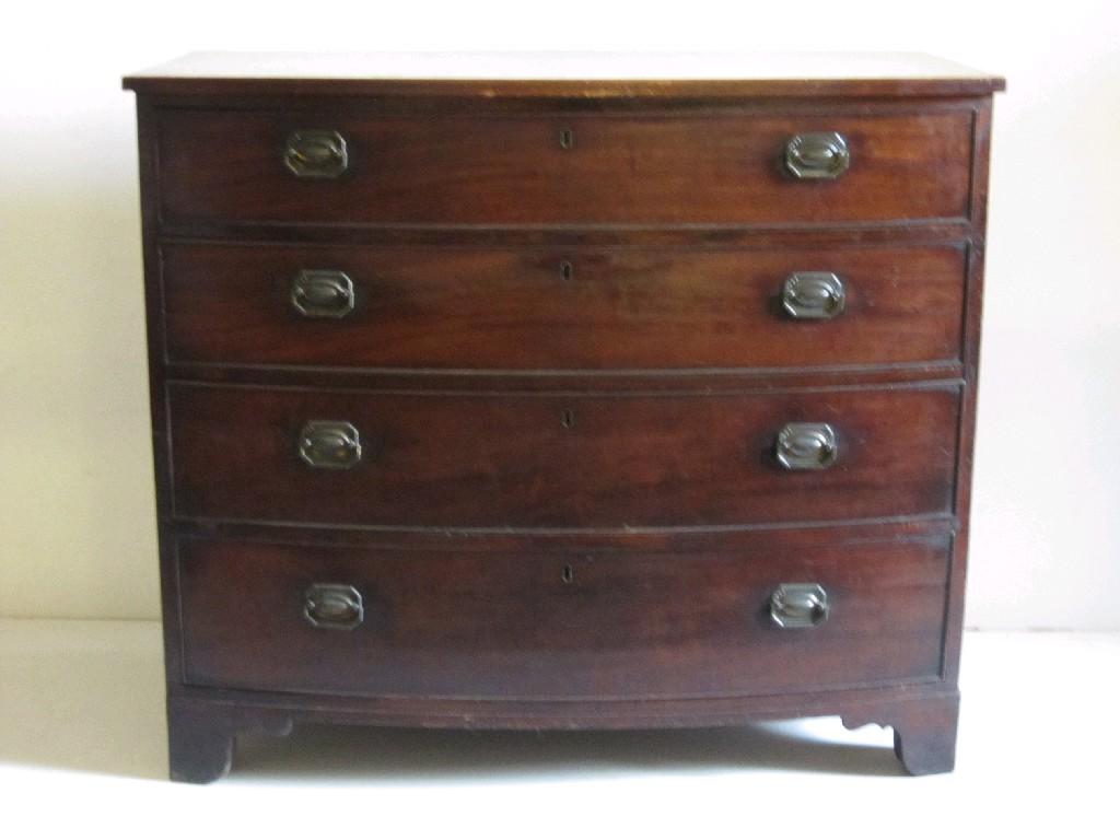 Appraisal: A late Georgian mahogany bow front Chest of four long