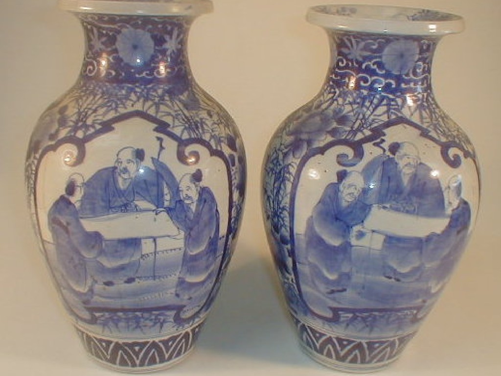 Appraisal: A pair of Japanese blue and white baluster vases each