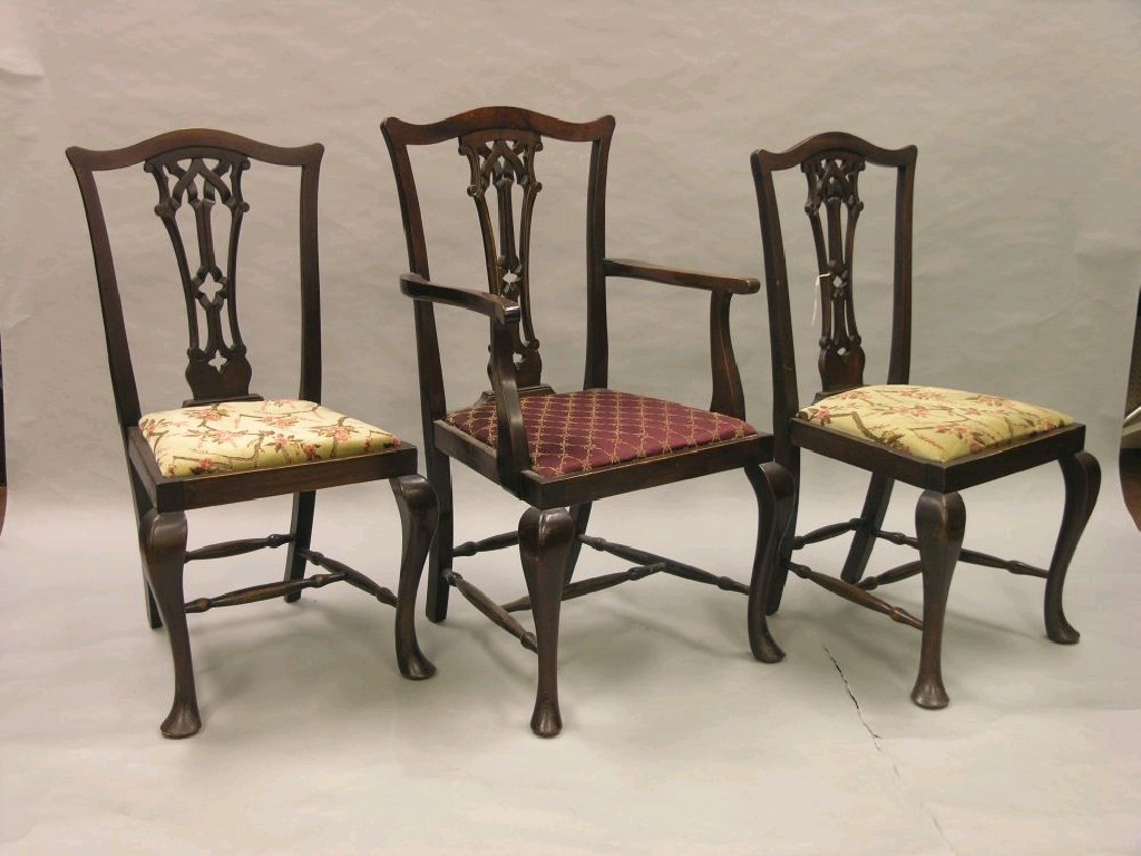 Appraisal: A set of seven Chippendale-style mahogany dining chairs including carver