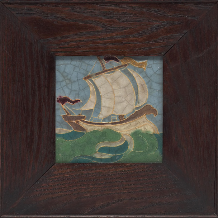 Appraisal: Grueby tile carved colorful ship design in a multicolored fine