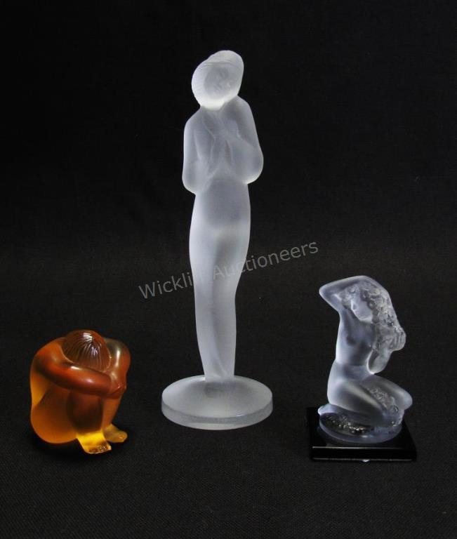 Appraisal: Three Lalique Crystal Figures amber crystal Nabhi meditating nude figure