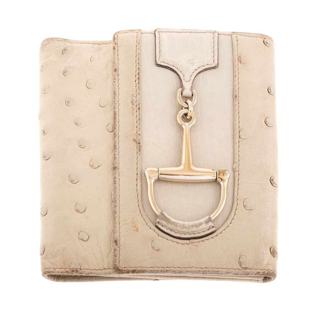 Appraisal: A Gucci Horse Bit Bifold Wallet An ivory ostrich embossed