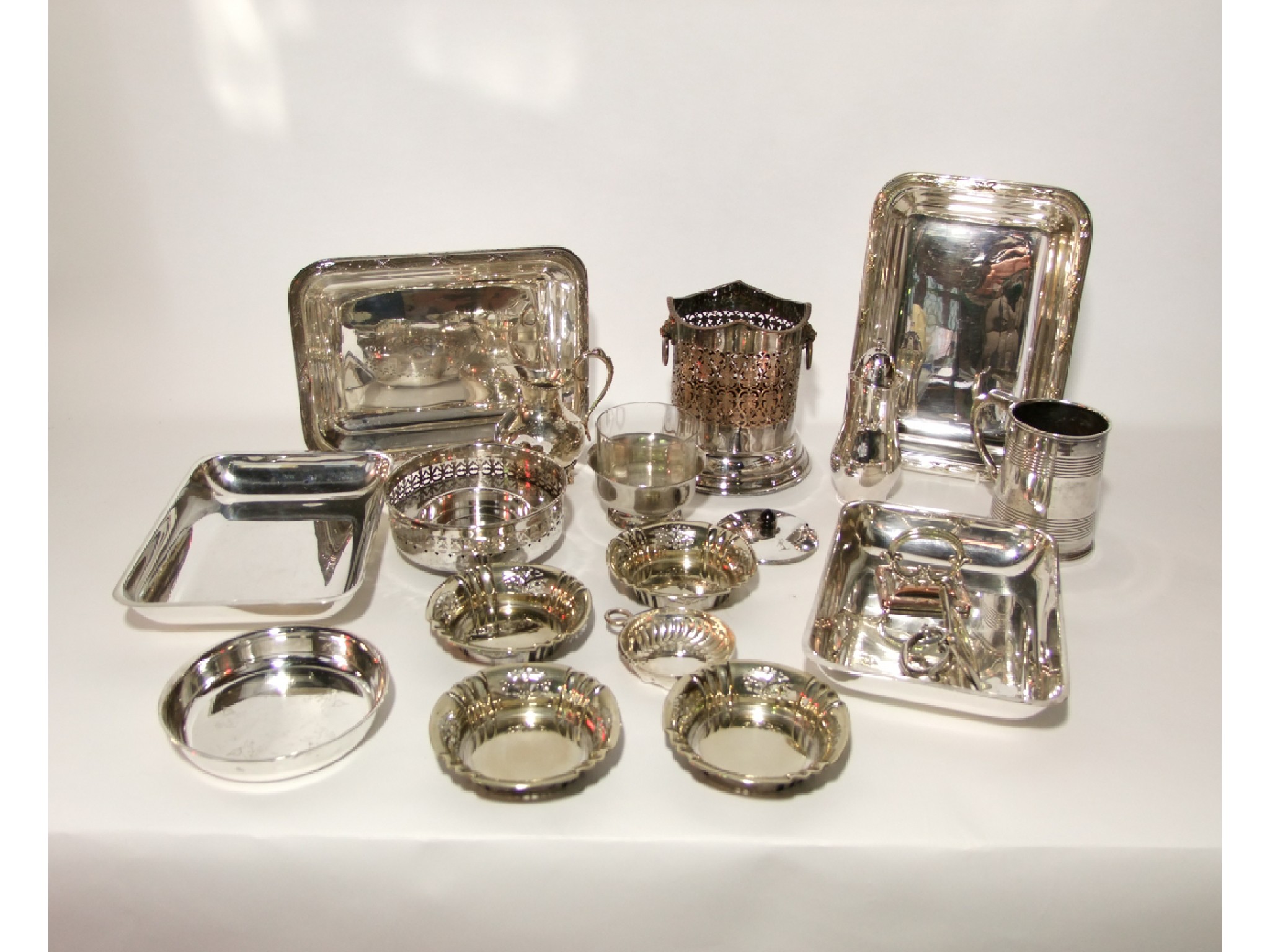 Appraisal: Assorted silver plated wares to include a bottle coaster with