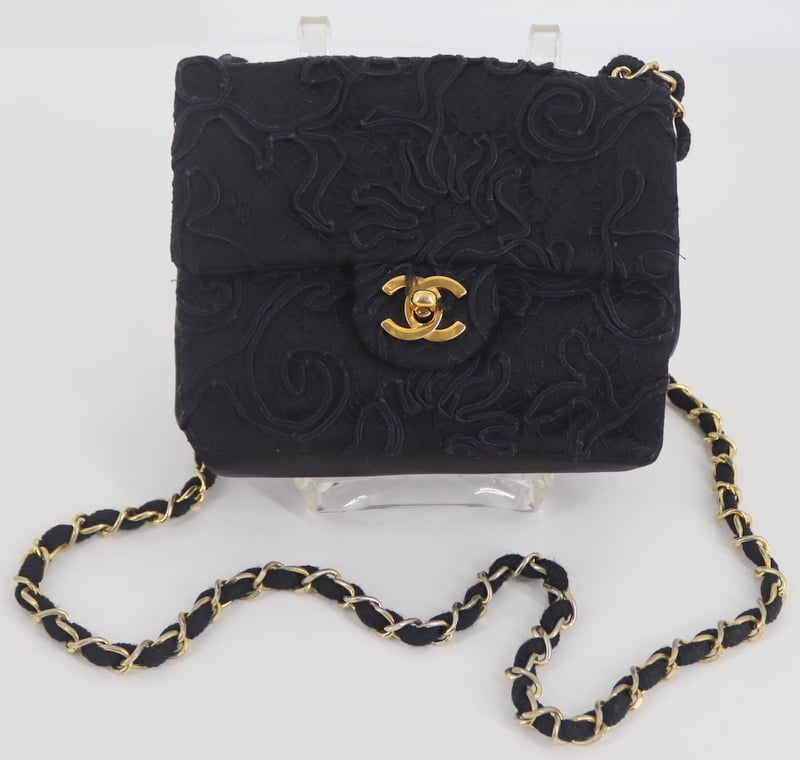 Appraisal: COUTURE CHANEL BLACK LACE AND SATIN SINGLE FLAP Purse With