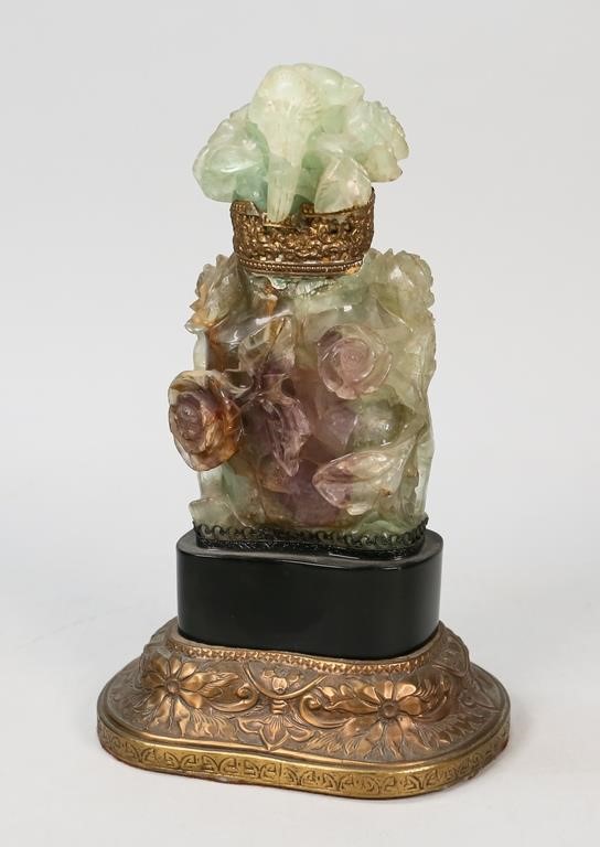 Appraisal: Chinese carved green quartz funerary urn Mounted on a repousse