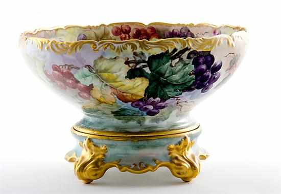 Appraisal: Tressemann Vogt porcelain centerbowl on stand circa gilt scalloped rim