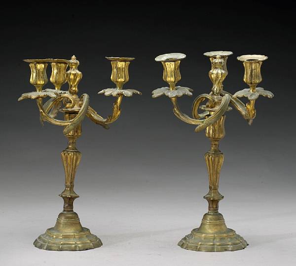 Appraisal: A pair of Louis XV gilt bronze three light candelabra