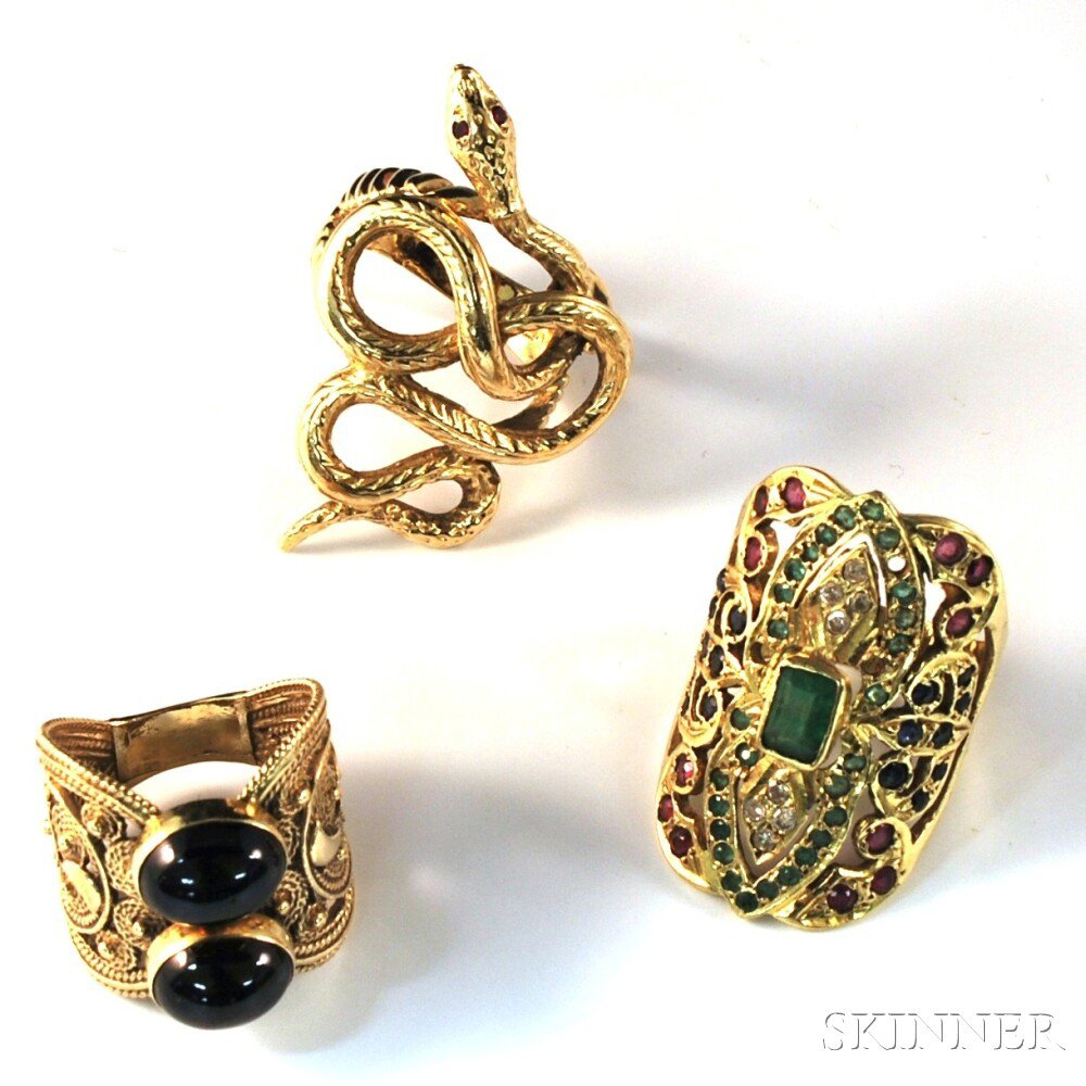 Appraisal: Three Large Gold Rings a kt gold snake ring with