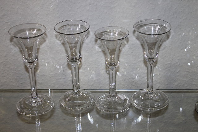 Appraisal: A COLLECTION OF FOUR TRUMPET SHAPED WINE GLASSES each with