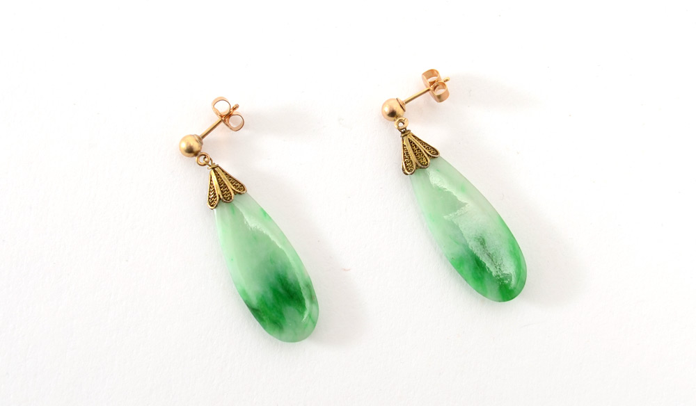 Appraisal: JADE EARRINGS K yellow gold post earrings with pear shaped