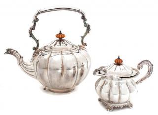 Appraisal: A Silver Teapot and Creamer A Silver Teapot and Creamer