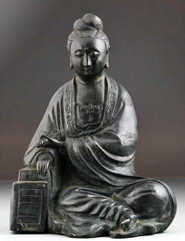 Appraisal: Chinese Qing Bronze GuanyinFinely cast to depict a seated Guanyin