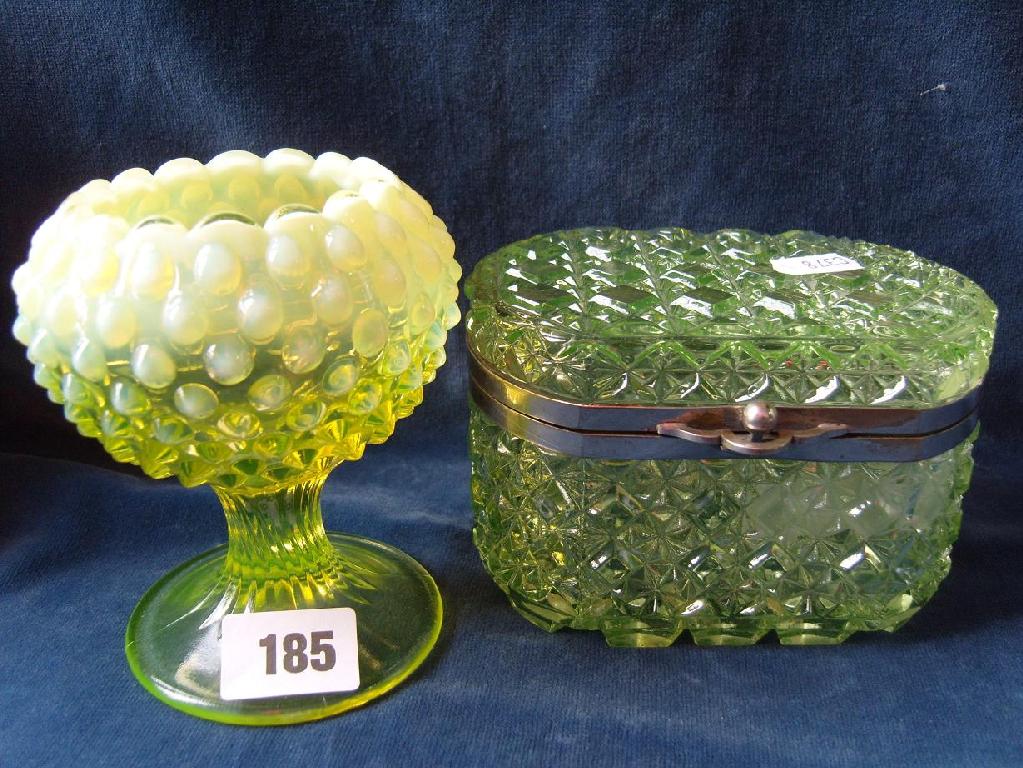 Appraisal: A late th century Vaseline glass vase with moulded studded