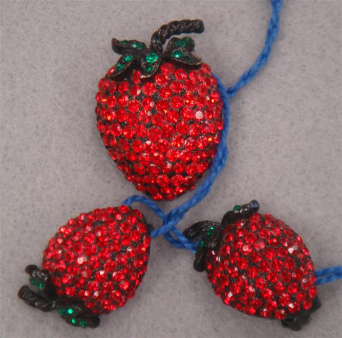 Appraisal: Weiss luscious red rhinestone strawberry pin and matching earrings Estimate