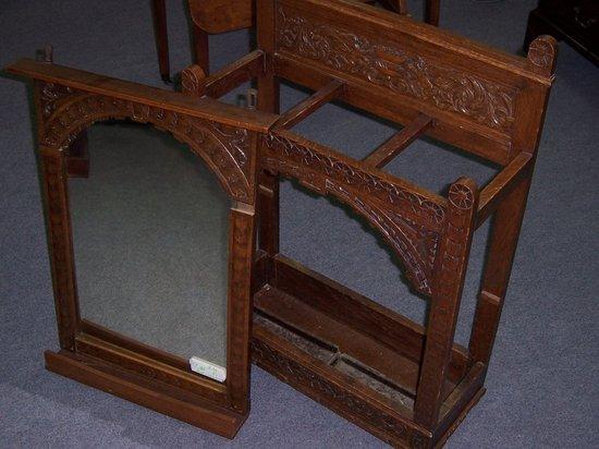 Appraisal: A carved oak stick stand cm wide and a matching